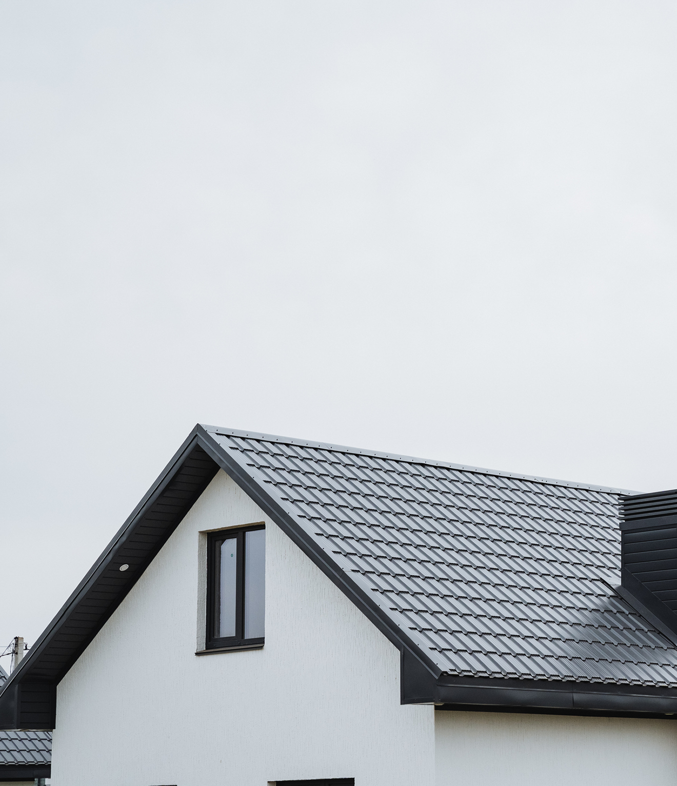 Modern house with a metal roof.