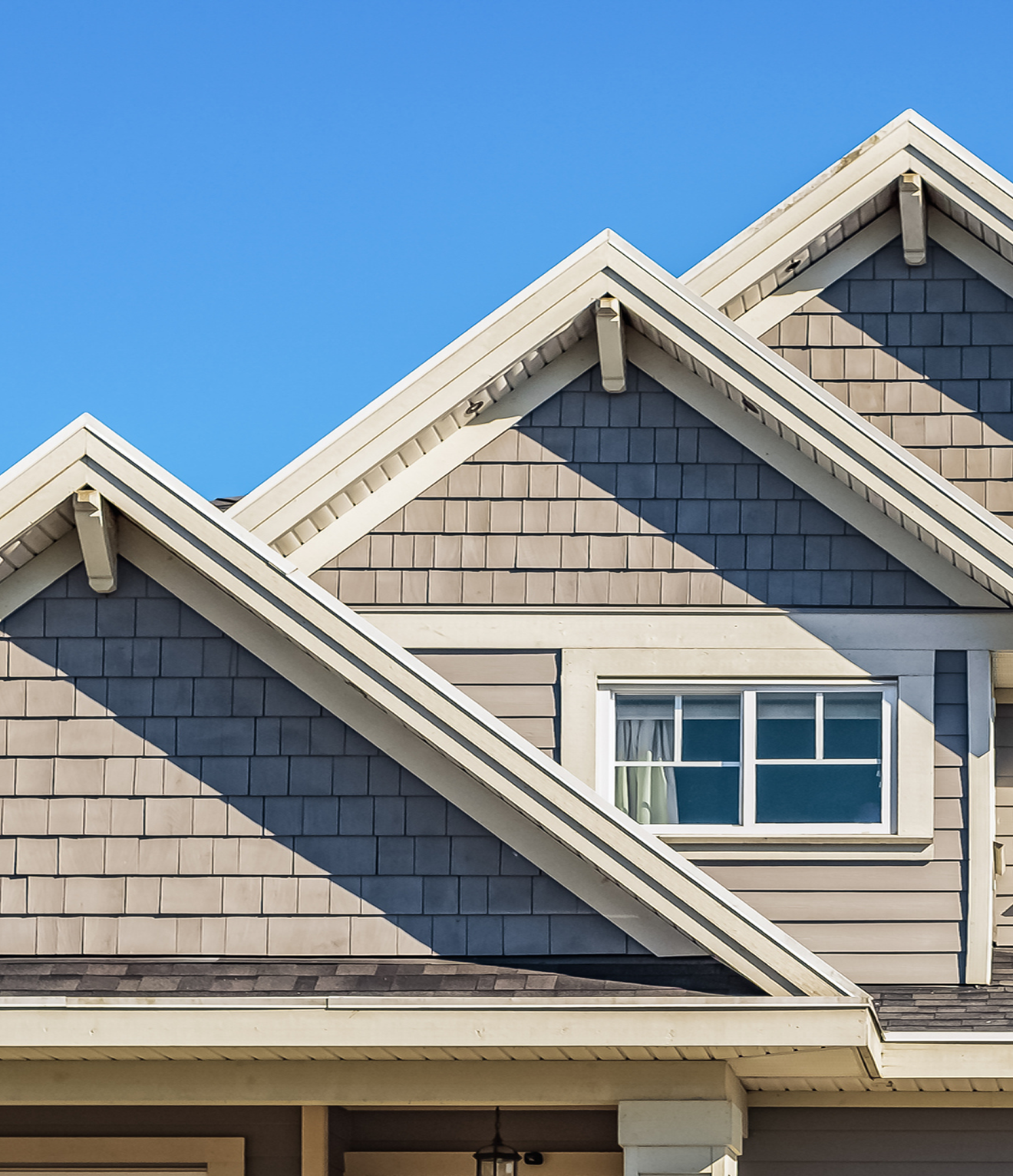 House roof with gable and window.